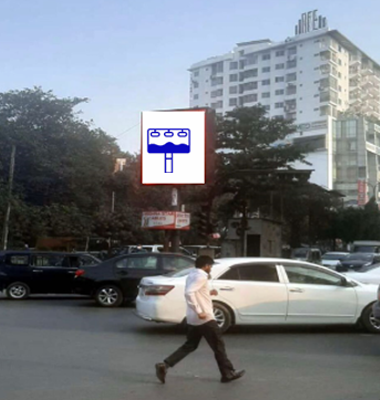High-resolution digital billboard at Dhanmondi-27, Mid Island, directly opposite Rapa Plaza in Dhaka, showcasing vibrant advertisements in a high-footfall urban area.
