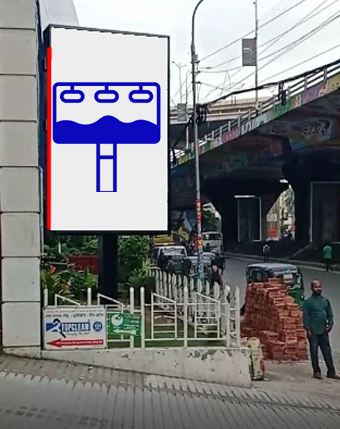 LED billboard at Mohakhali SKS Tower-02 displaying a vibrant digital advertisement, facing Jahangir Gate in Dhaka’s busy traffic zone.